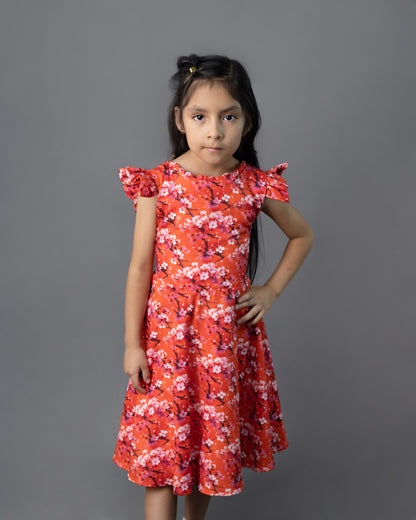 Vestido floreado con mangas desplegable